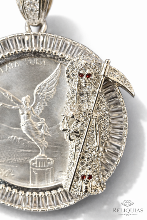 Dije Onza Libertad Plata .999 con Bisel Santa Muerte
